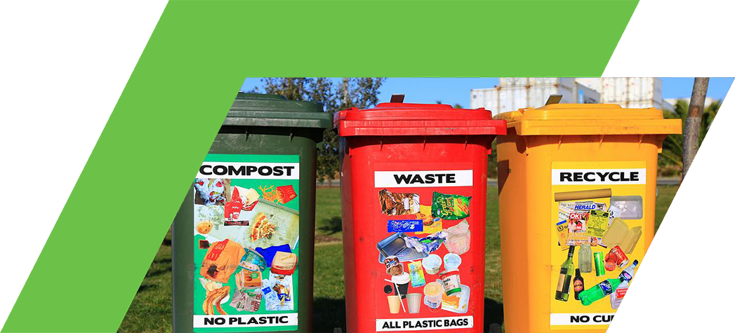 Three recycling bins labeled "Compost," "Waste," and "Recycle," each displaying images of acceptable items for disposal.