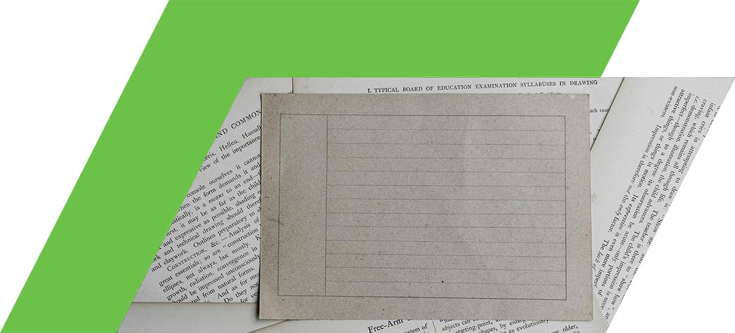 A collection of old pages with text, featuring a blank card in the center.