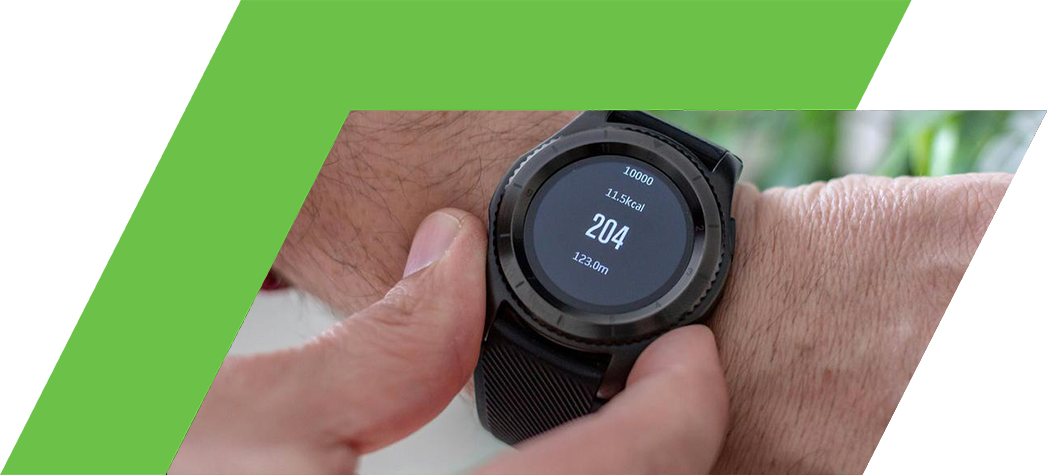 A close-up of a person's wrist wearing a smart watch displaying fitness statistics.