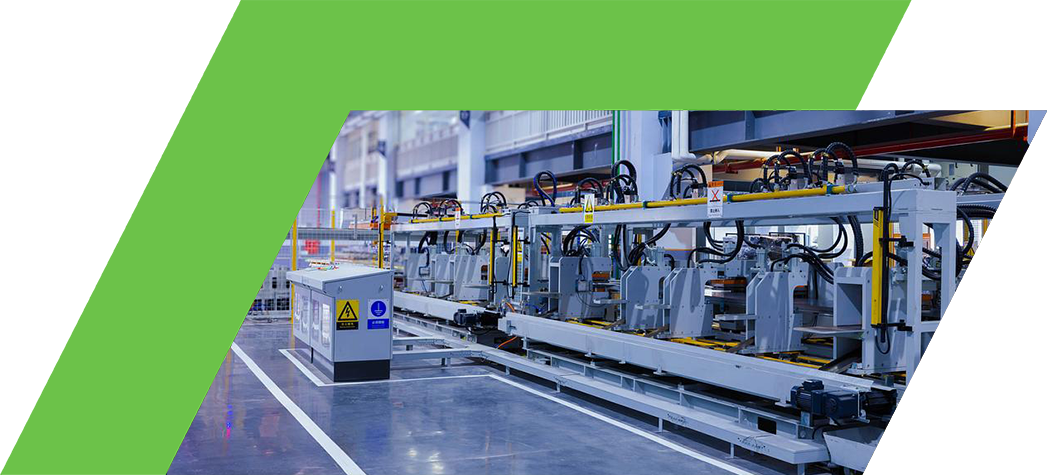 A modern industrial facility featuring advanced robotic machinery arranged along a production line.
