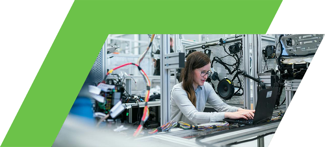 A lady working in a manufacturing facility.