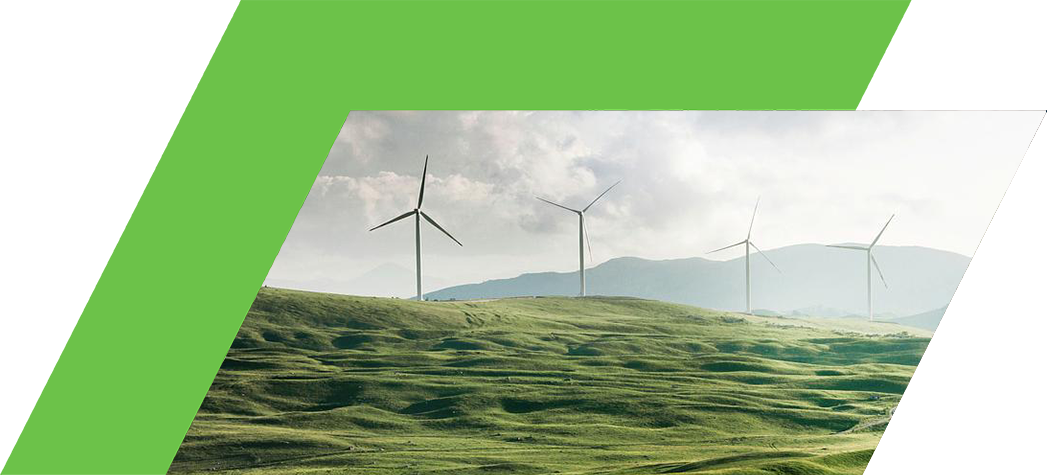 A scenic landscape featuring rolling green hills and several wind turbines under a cloudy sky.