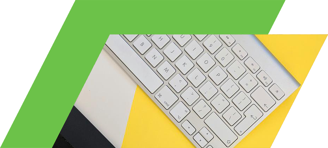 A top-down view of a black drawing tablet, a stylus, and a white keyboard on a vibrant yellow background.