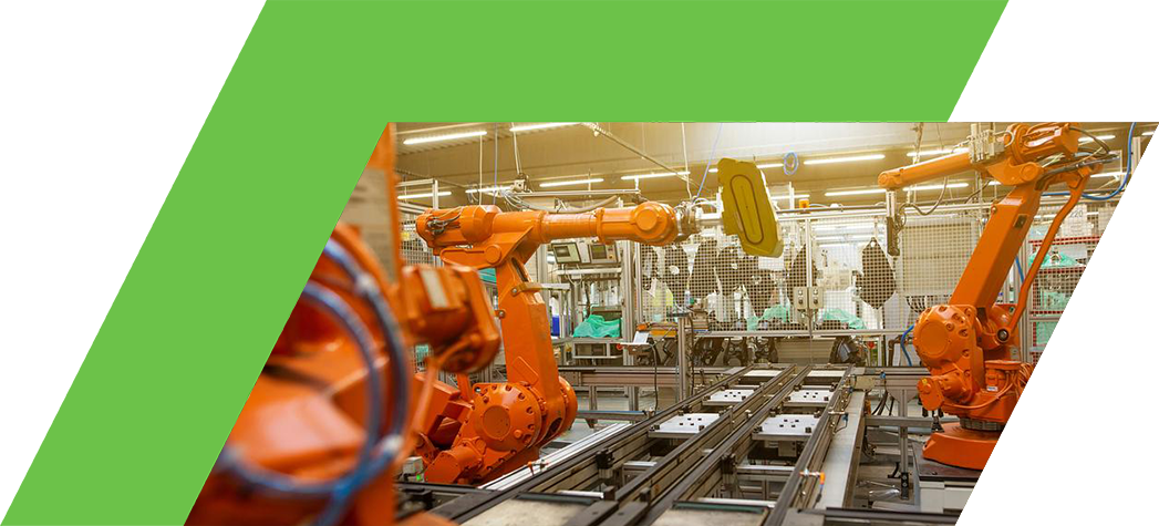 A modern manufacturing facility featuring multiple orange robotic arms engaged in assembly work.