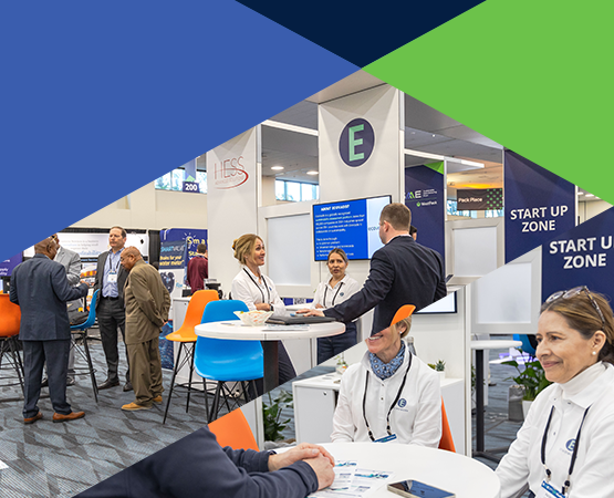 Multiple kiosks with digital displays & a professional businesswoman multitasking at a trade show with a digital tablet